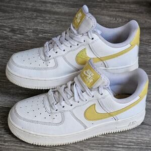 women's Nike Air Force 1 Low sneakers US 7.5 white Saturn Gold 315115-170